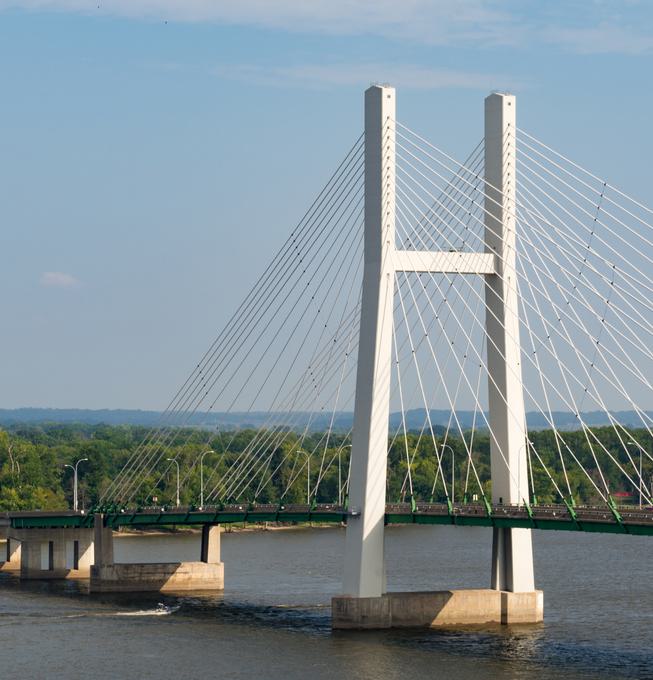 Aerial view of the Burlington river featuring a large white bridge