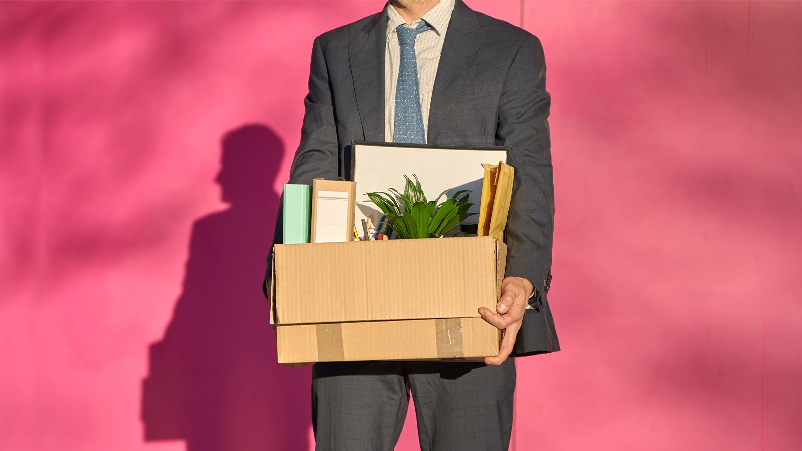 man carrying box