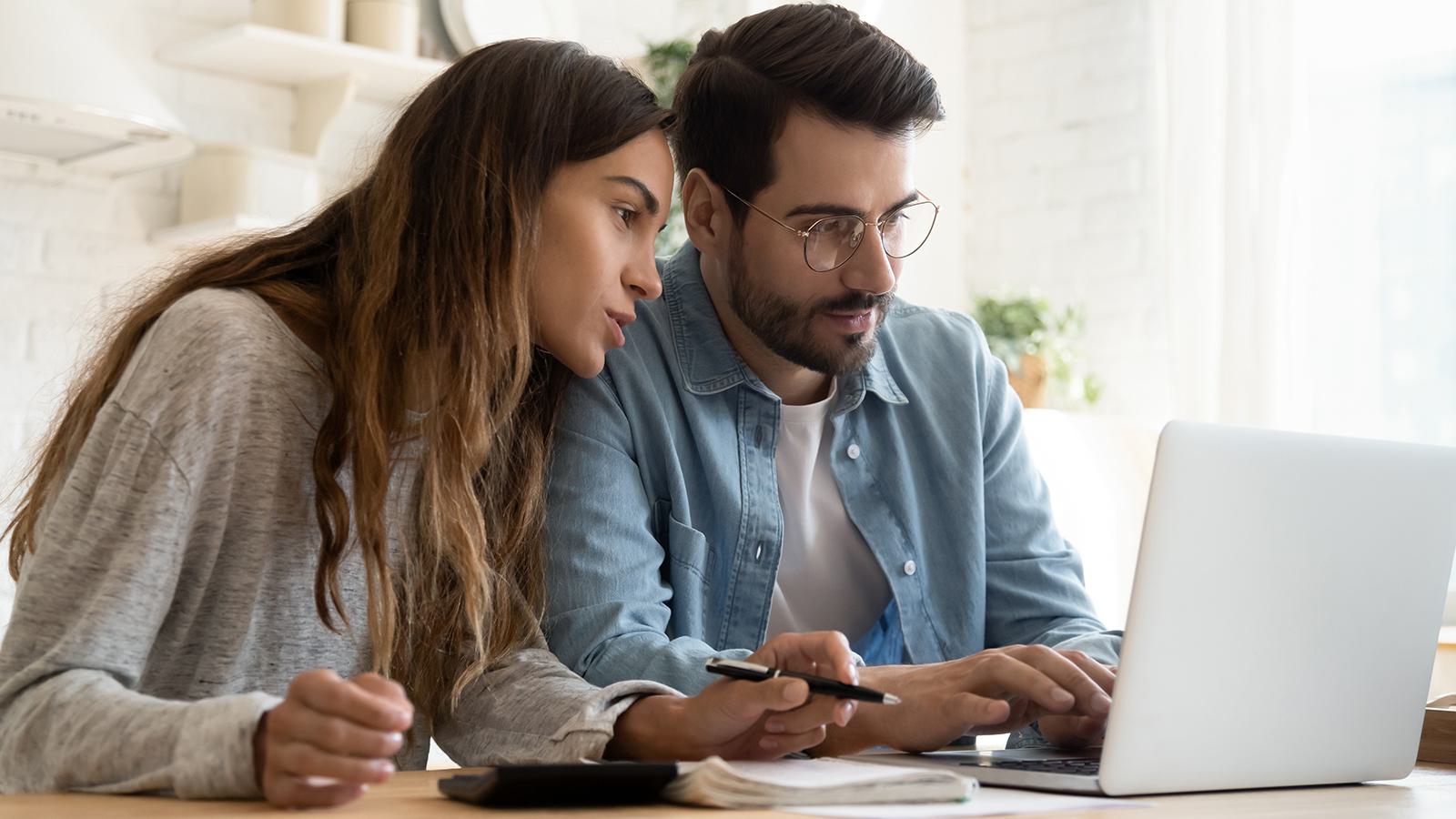 couple looking at a laptop computer