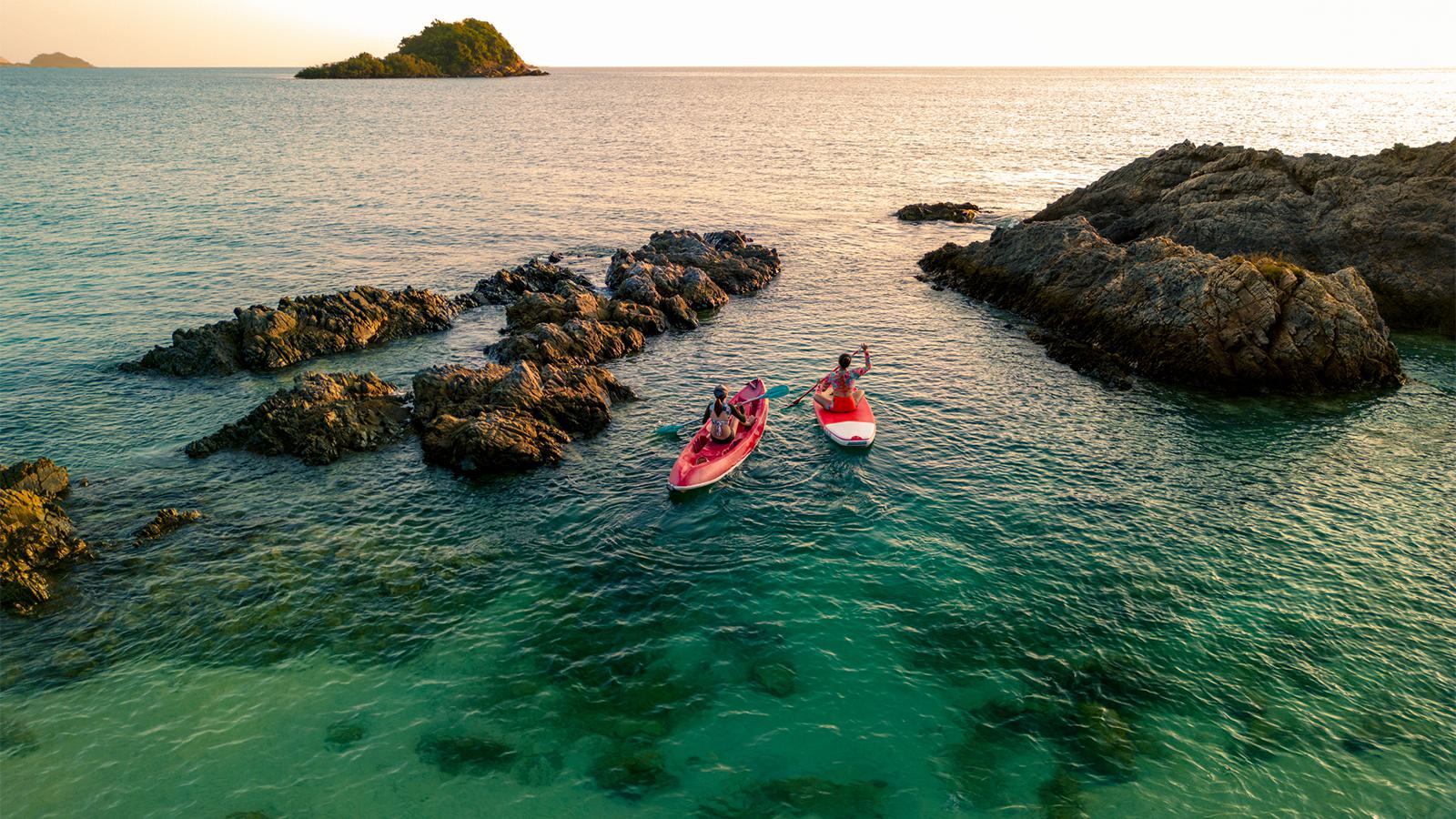 two people canoeing