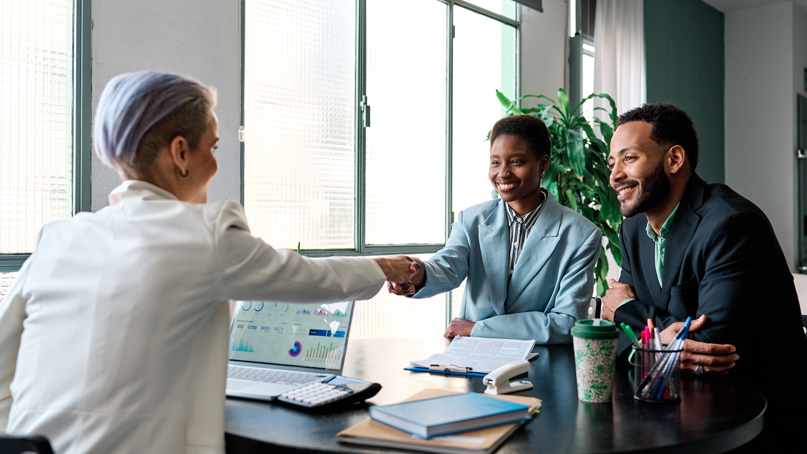 advisors shaking hands